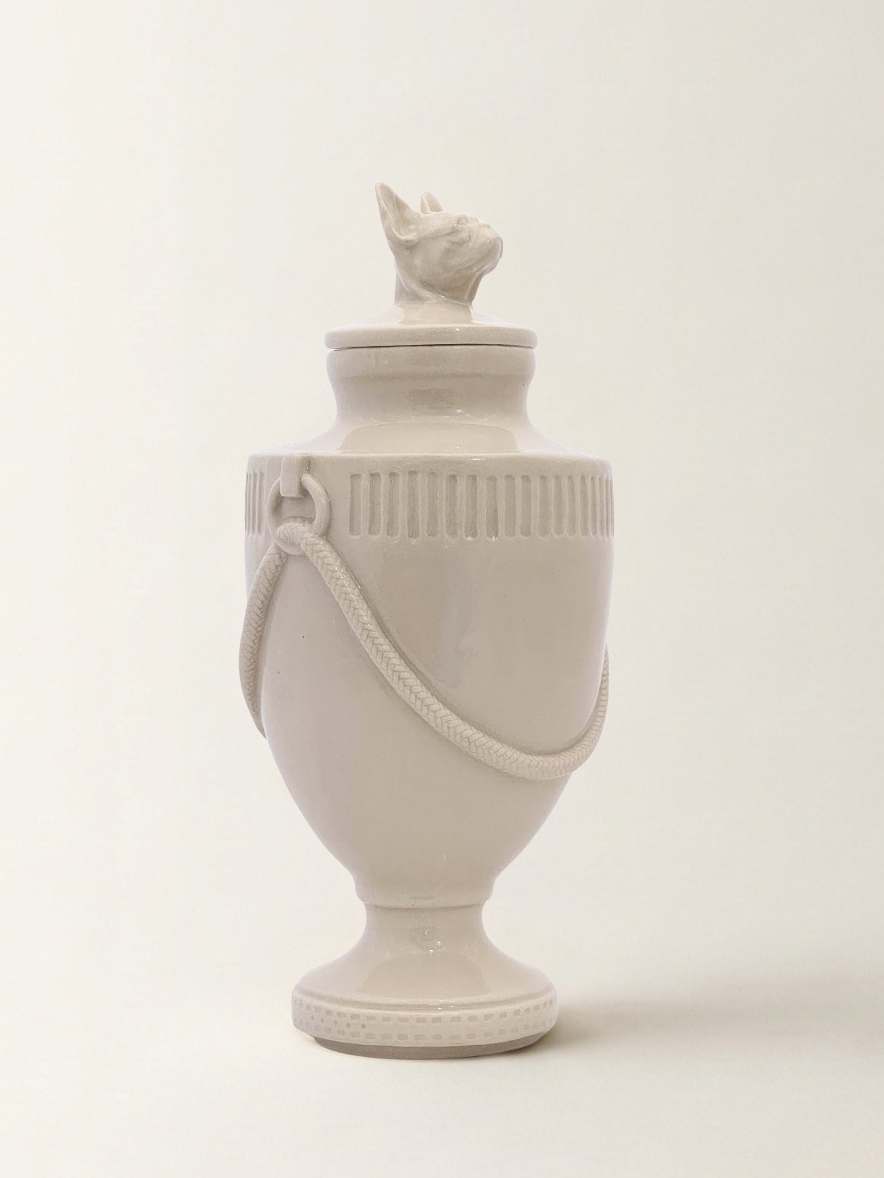 Ceramic pet memorial urn with French Bulldog figure at the crown, handcrafted porcelain dog urn