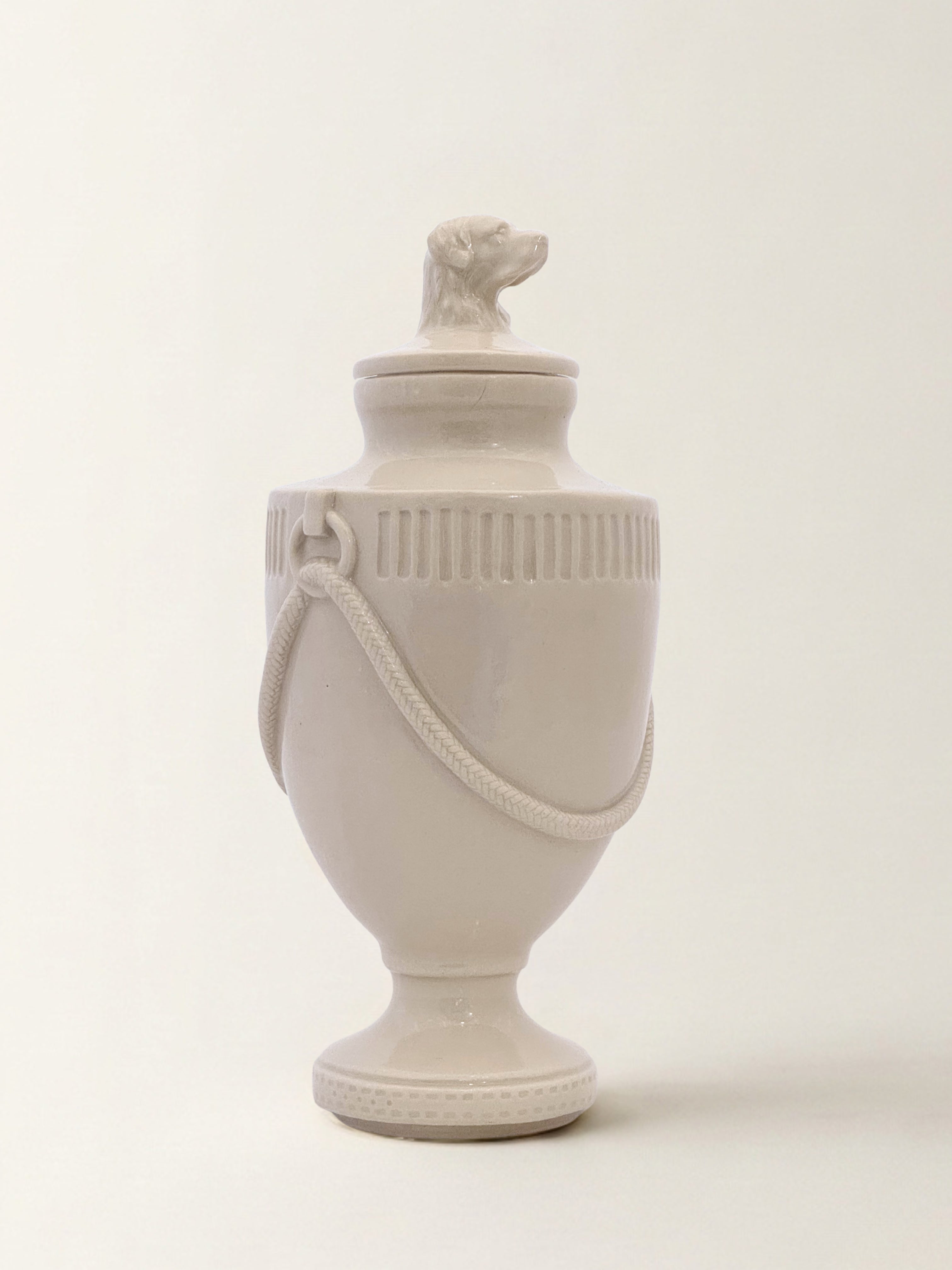 Ceramic pet memorial urn with Retriever figure at the crown, handcrafted porcelain dog urn
